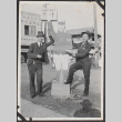 Two men with street sign (ddr-densho-326-111)