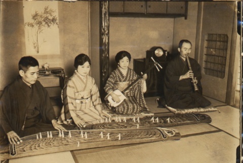 Michio Miyagi, Seifu Yoshida and two women posing with instruments (ddr-njpa-4-724)