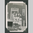 Fourteen women on steps (ddr-densho-471-77)