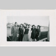 Group of five women and two men outside barracks (ddr-densho-356-1079)
