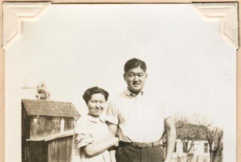 Photo of man and woman with dog (ddr-densho-341-64)