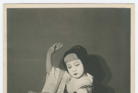 Girl posed in kabuki makeup and costume (ddr-densho-383-431)