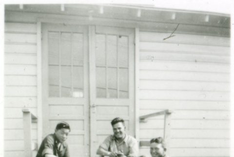 Three on stoop (ddr-densho-1007-599)