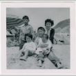 Yoshiko, William, Susan and Leslie Shiomi on beach with unidentified boy (ddr-densho-522-364)