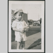 Photo of a child holding a bag (ddr-densho-483-719)
