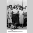 Three women and a baby on sidewalk (ddr-ajah-6-845)