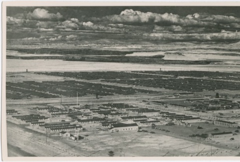 Aerial view of Tule Lake with Abalone Hill in the distance (ddr-densho-296-25)