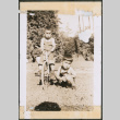 Two children with a tricycle (ddr-densho-483-1082)