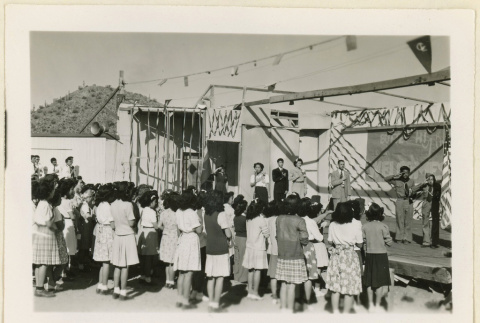 Salute to the flag at a convention (ddr-densho-37-1116)