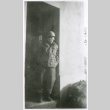 Soldier in doorway (ddr-densho-1007-801)