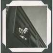 Women leaning out a window (ddr-densho-321-85)