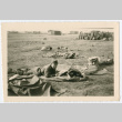 Soldier laying on sleeping mat outside (ddr-densho-368-133)