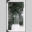 Photo of two boys with a statue (ddr-densho-483-1220)