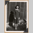 Woman standing in a dark suit (ddr-densho-542-294)