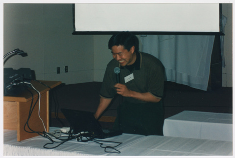 Tom Ikeda speaking at Densho Golf Tournament (ddr-densho-506-142)