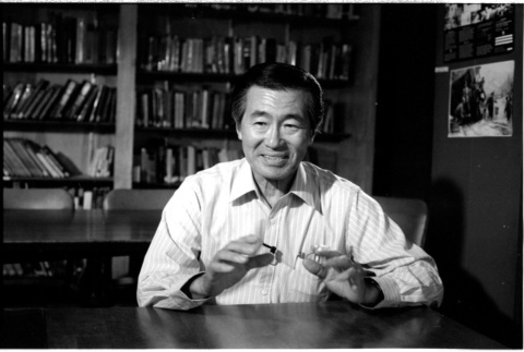 Frank S. Emi at desk (ddr-densho-1007-1154)
