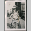 Photo of a boy riding a tricycle (ddr-densho-483-804)