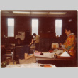 Four people working in office (ddr-densho-426-1250)