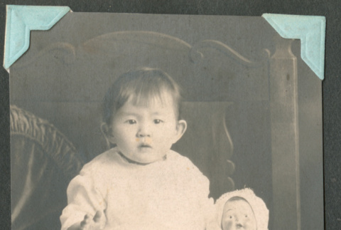 Child with doll (ddr-densho-442-24)