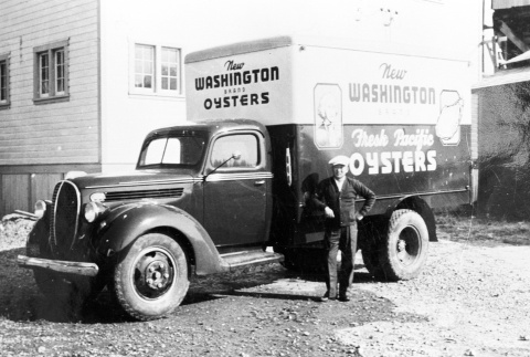 Man next to oyster delivery truck (ddr-densho-39-47)