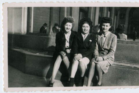 Three women sitting on bench (ddr-densho-368-219)