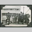 Group of men peering at ship (ddr-densho-540-61)