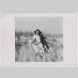 Photo of Kuniko Sumi on beach (ddr-densho-399-10)