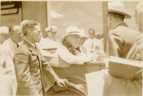 Franklin D. Roosevelt wearing leis in a car (ddr-njpa-1-1606)