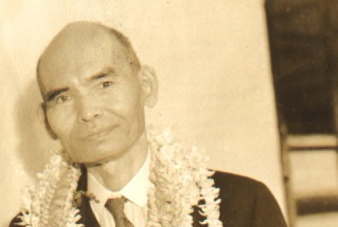 Kiyoshi Kawakami wearing leis (ddr-njpa-4-674)