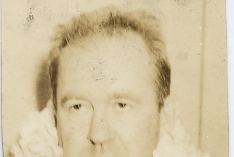 Man wearing leis (ddr-njpa-1-299)