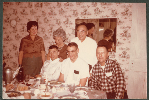 Sakura family at dinner table (ddr-densho-523-383)