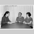Interviewer with narrators at table (ddr-densho-506-61)