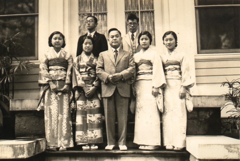 Kanekazu Okada and others posing with young women in kimono (ddr-njpa-4-1987)