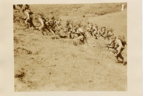 Soldiers running up a hill and marching in formation (ddr-njpa-6-64)