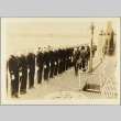 Navy crew saluting officers on the deck of a submarine (ddr-njpa-13-149)
