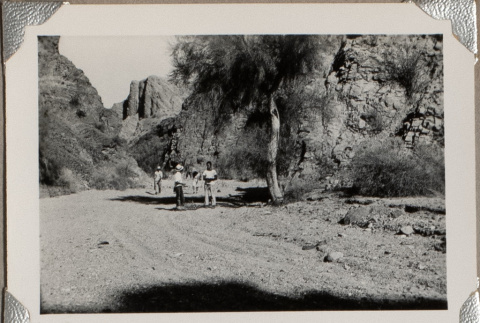 Group walking on dirt road (ddr-densho-587-29)