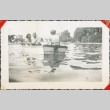 Group on a row boat (ddr-densho-321-1114)