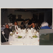 Group sitting around banquet table (ddr-densho-466-547)