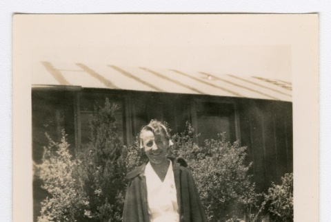 Henrietta Schoen posing in open cloak (ddr-densho-223-23)