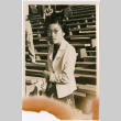 Woman in outdoor stadium seating (ddr-densho-426-1487)