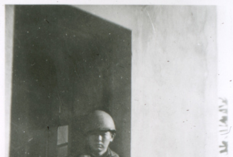 Soldier in doorway (ddr-densho-1007-801)