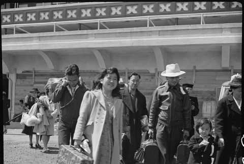 Japanese Americans arriving at Tanforan (ddr-densho-151-155)