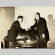 Two men shaking hands (ddr-njpa-1-1743)