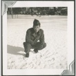 A soldier kneeling in snow (ddr-densho-328-521)