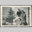 Family by Christmas tree (ddr-densho-316-318)