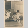 The Kageyama children on the steps of their house (ddr-densho-287-9)