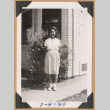 Girl outside a building (ddr-densho-542-225)