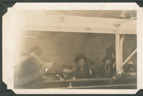 Photo of women with children on a ship deck (ddr-densho-483-279)