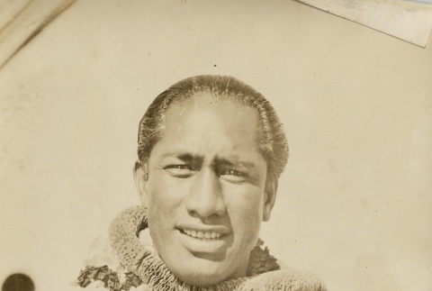 Duke Kahanamoku wearing leis (ddr-njpa-2-499)