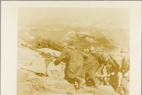 Soldiers moving an anti-aircraft gun (ddr-njpa-13-801)